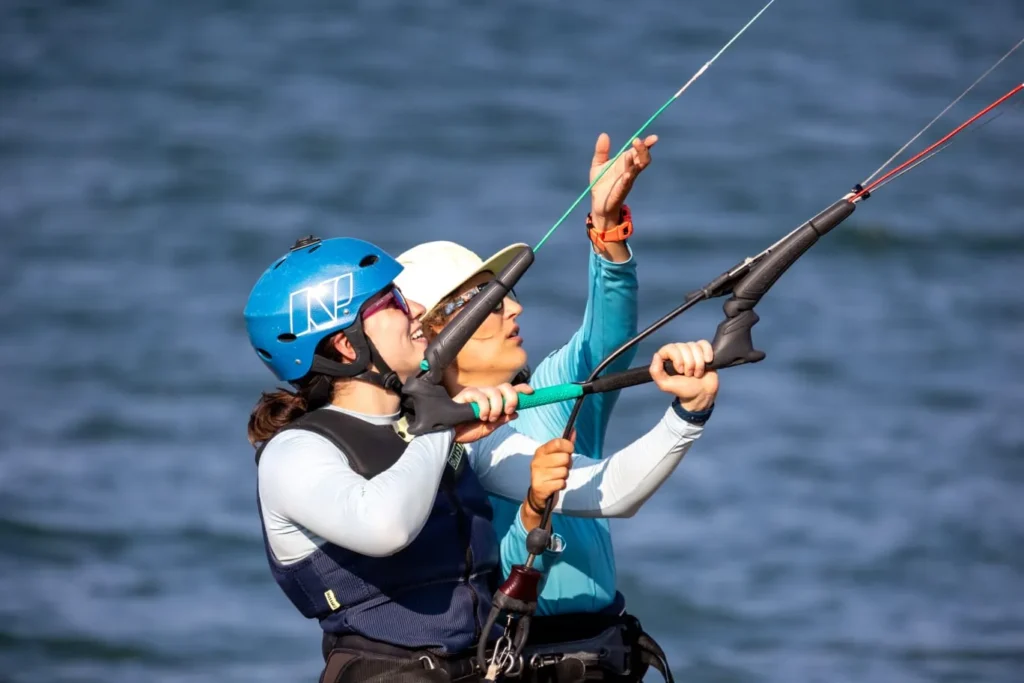 Arja while giving a kitesurfing lesson in playa copal costa rica